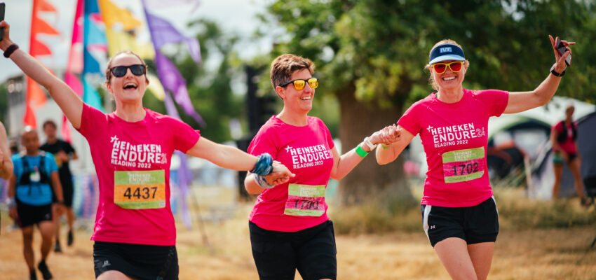 3 ladies celebrate success at a 24 hour relay